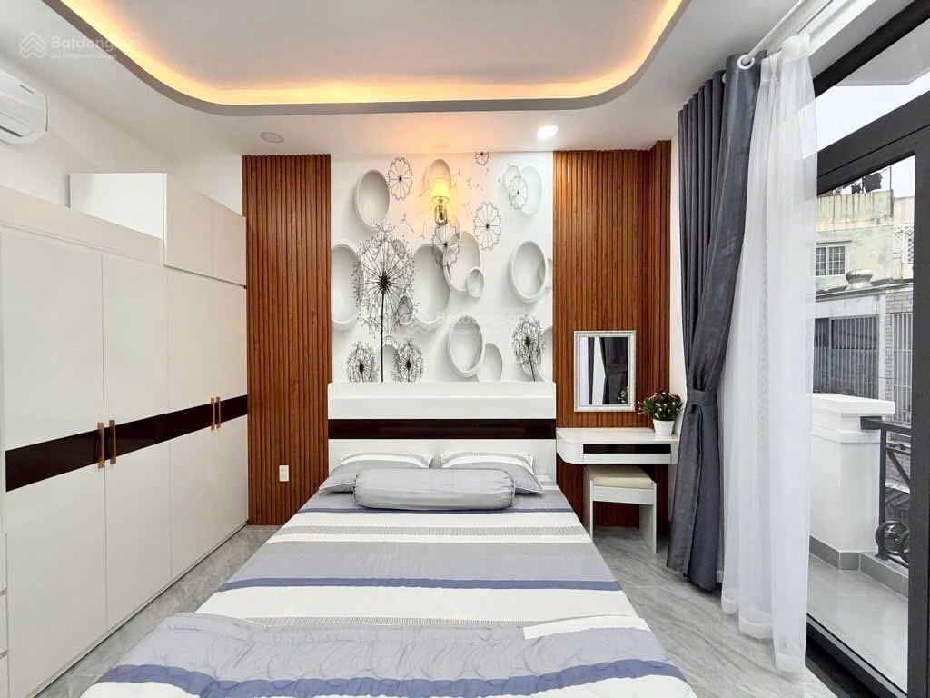 Nhà gò vấp giáp ranh pn  hẻm xe hơi 7 chỗ  50m2 (3.5x15)  4 tầng  nhà mới dọn vào ở ngay