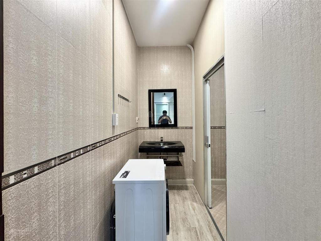 Chung cư mini nằm ngay cầu thị nghè mới xây 100% cốt nhà biệt thự full nt máy giặt riêng