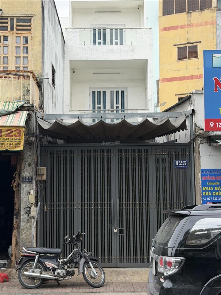Cho thuê nhà mặt tiền nguyên căn, đường lê đại hành q11, giá 28tr/th