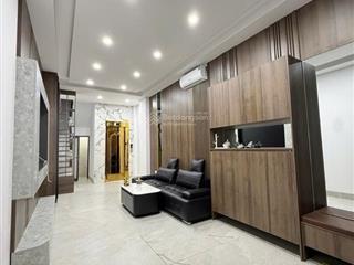 Nhà đẹp trần khát chân  ô tô cách 20m  6 tầng thang máy. giá hơn 9 tỷ.  0779 548 ***