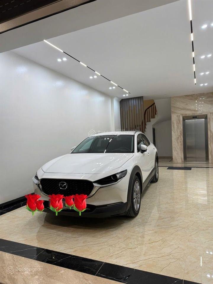 Hơn 12 tỷ, phố trạm, ô tô vào ,55 m2 6 tầng,thang máy, ngõ thông