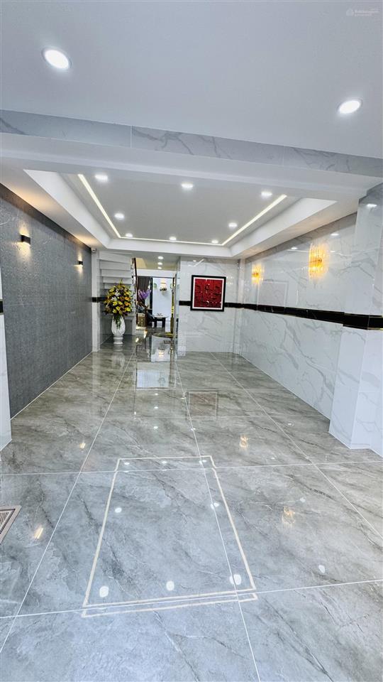 Mặt tiền kinh doanh  xây mới 100%  6 tầng thang máy  69.2m2  5pn  7vs  gara ô tô  15.8 tỷ