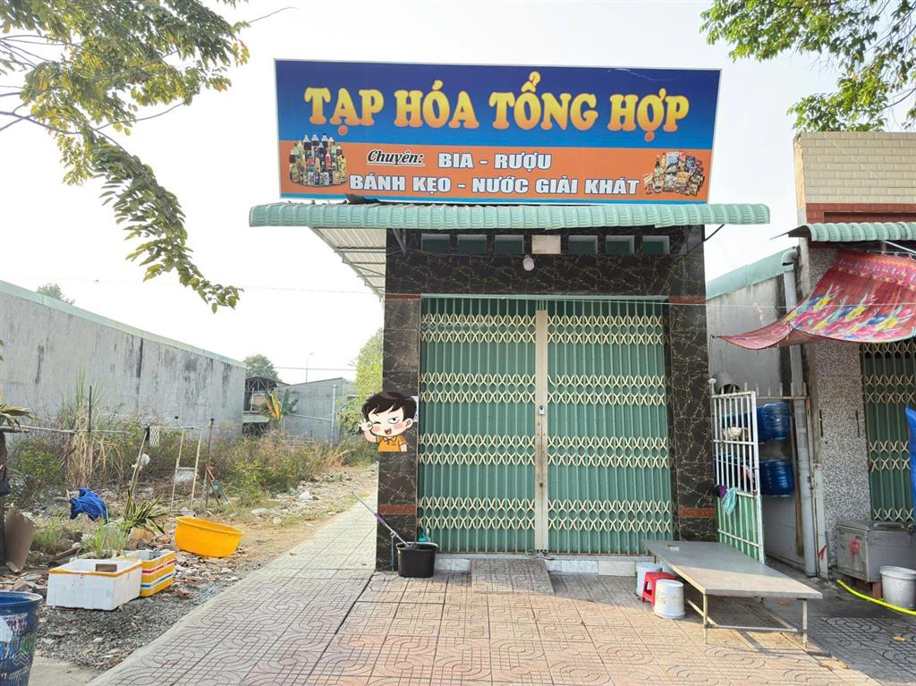 Dãy trọ đang kinh doanh tạp hóa phía trước sau lưng chợ mỹ phước 3 150m2 full phòng thu nhập 8tr