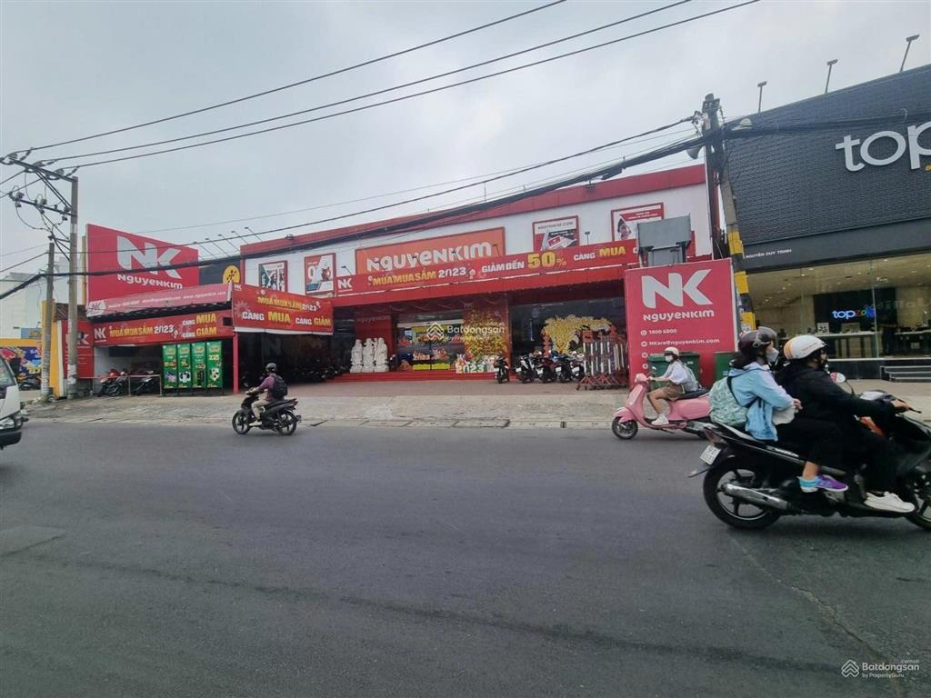 Bán khuôn đất 1030m2 mt nguyễn văn quá quận 12. dt 15 x 51m nở hậu 30m. gpxd hầm 12 tầng. 95 tỷ