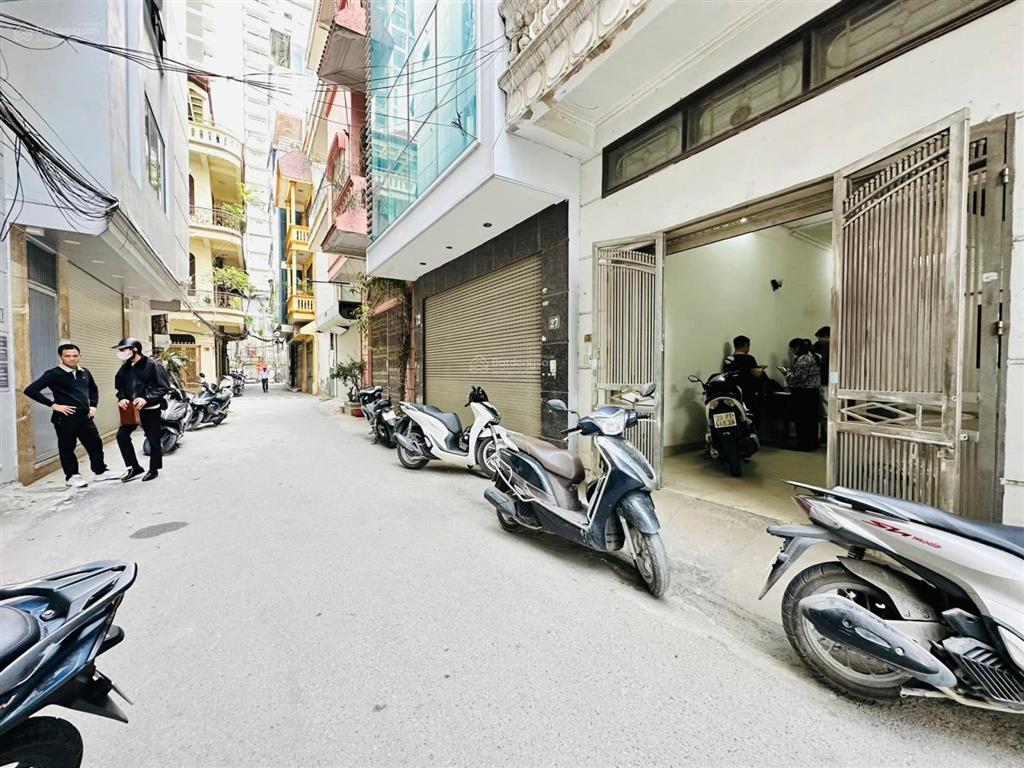 Giảm 2 tỷ  chỉ còn 23 tỷ  khuất duy tiến  65m,mt 5,5m  5 tầng dân xây  gara  ngõ thông ô tô .