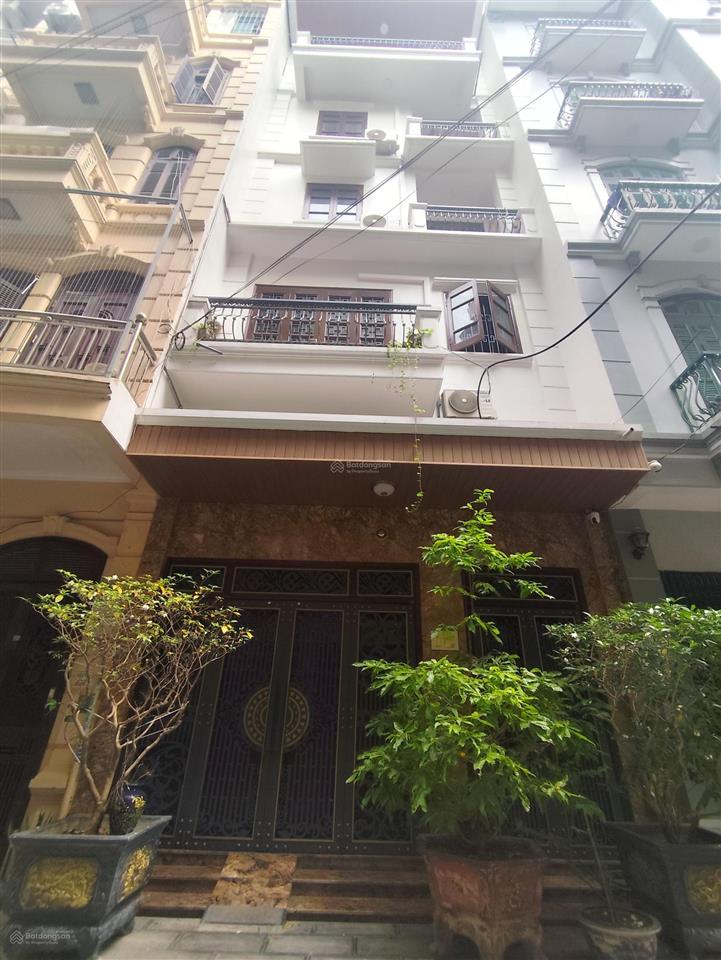 Giảm 2 tỷ  chỉ còn 23 tỷ  khuất duy tiến  65m,mt 5,5m  5 tầng dân xây  gara  ngõ thông ô tô .