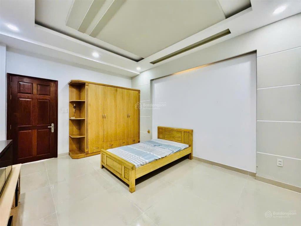 Bán nhà hẻm 20/nguyễn văn dung p. an nhơn, dt 4x17 đúc 5 tầng ô tô ngủ trong nhà.
