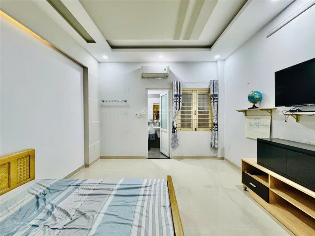 Bán nhà hẻm 20/nguyễn văn dung p. an nhơn, dt 4x17 đúc 5 tầng ô tô ngủ trong nhà.