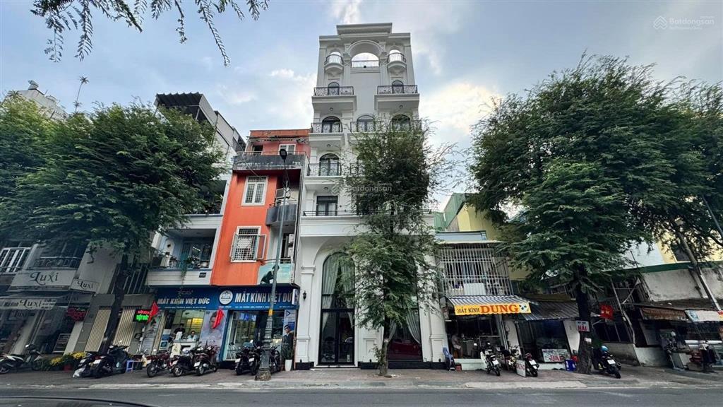 Cho thuê toà nhà mặt tiền vạn kiếp, bình thạnh  trung tâm phố ẩm thực  hầm 7 tầng, thang máy pccc