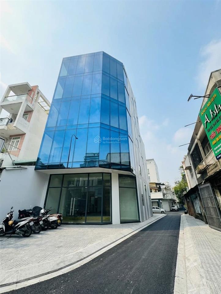 Cho thuê tòa nhà góc mặt tiền nơ trang long  hầm trệt 4 lầu, tm pccc