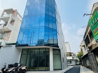 Cho thuê tòa nhà góc mặt tiền nơ trang long  hầm trệt 4 lầu, tm pccc