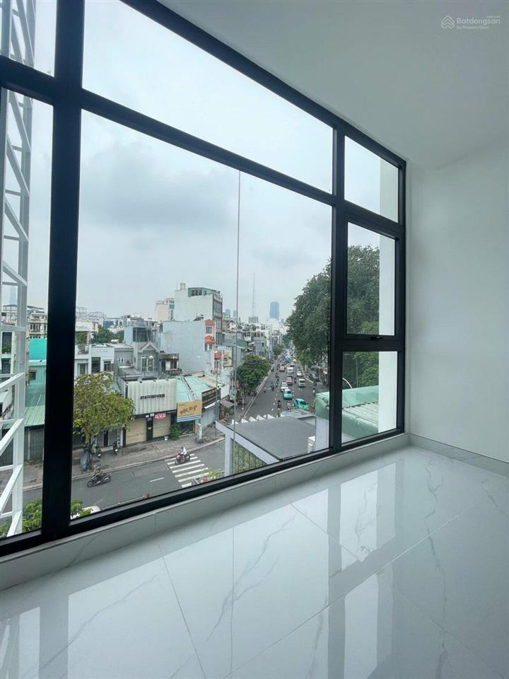 Cho thuê tòa nhà mặt tiền đinh tiên hoàng, quận 1  6 tầng dtsd 600m2