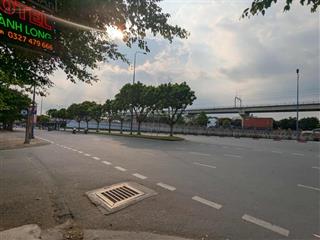 Nhà mặt tiền song hành thông hẻm xe hơi mặt sau