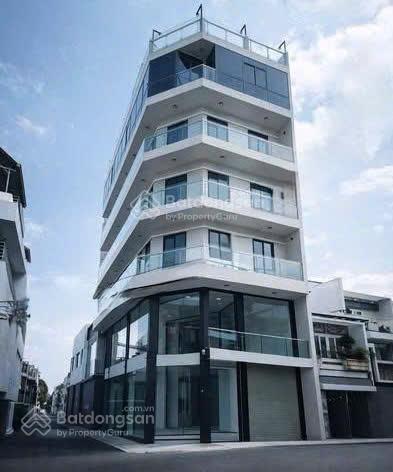 Building góc 2 mặt tiền lương định của hầm + 4 tầng setup linh hoạt