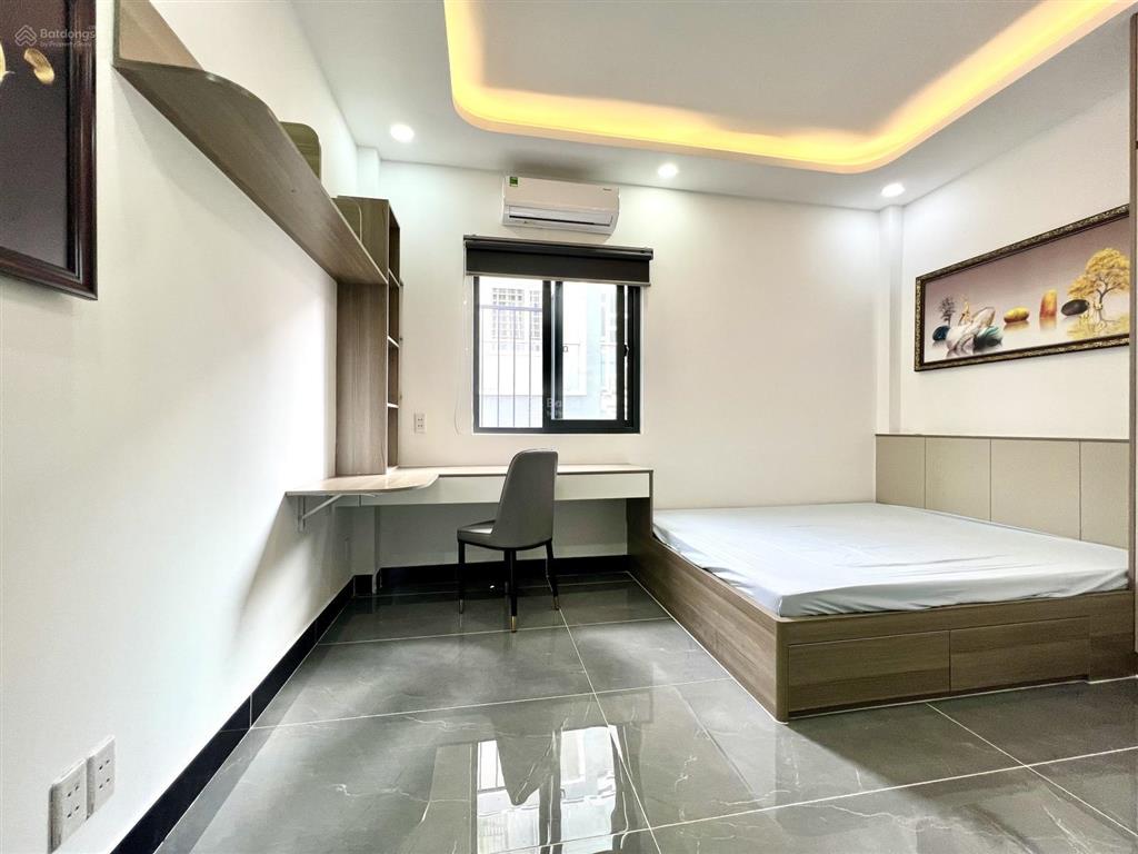 Cho thuê căn hộ mới 100% có máy giặt riêng ban công gần ngã 4 phú nhuận, quận phú nhuận 0337 740 ***