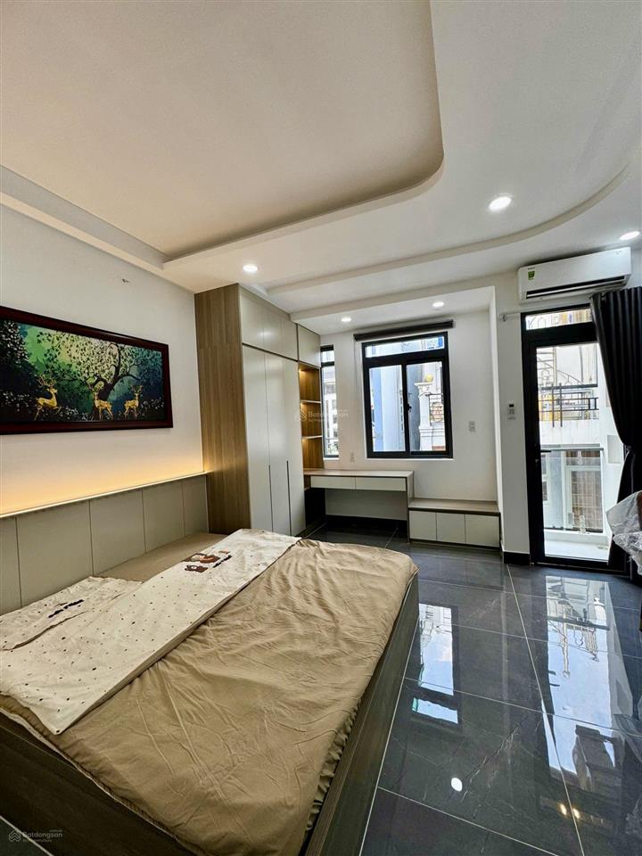Cho thuê căn hộ mới 100% có máy giặt riêng ban công gần ngã 4 phú nhuận, quận phú nhuận 0337 740 ***