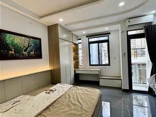 Cho thuê căn hộ mới 100% có máy giặt riêng ban công gần ngã 4 phú nhuận, quận phú nhuận 0337 740 ***