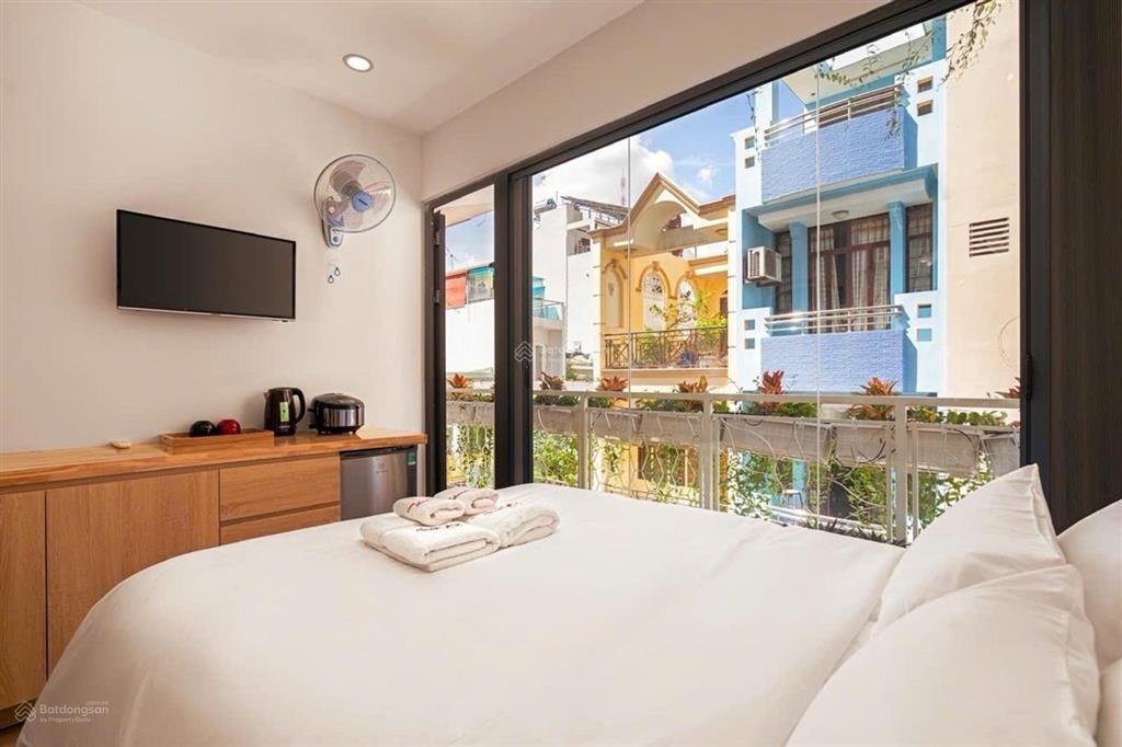 Dòng tiền 1,5tỷ/ năm  toà nhà trần hưng đạo bến thành quận 1  12pn  có thang máy