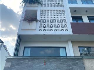 "hot" 4 tầng 4 phòng 52m2, vị trí gần vincom, ngay phạm văn đồng
