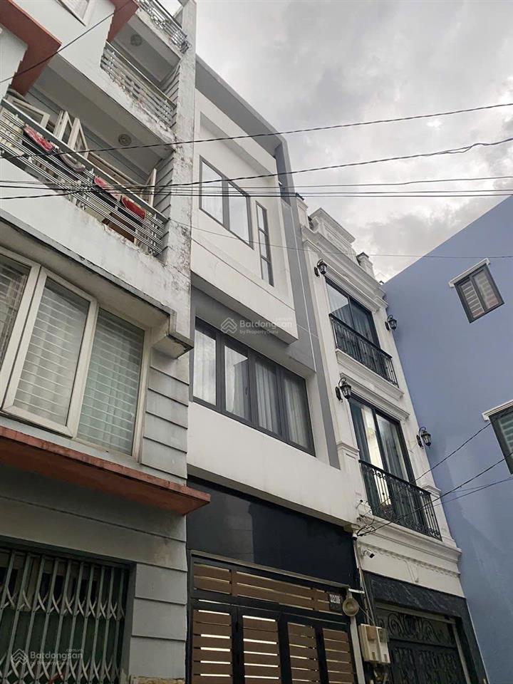 "vip dương quảng hàm" 4 tầng mới (4x15m), xe hơi vào nhà, gần phạm văn đồng