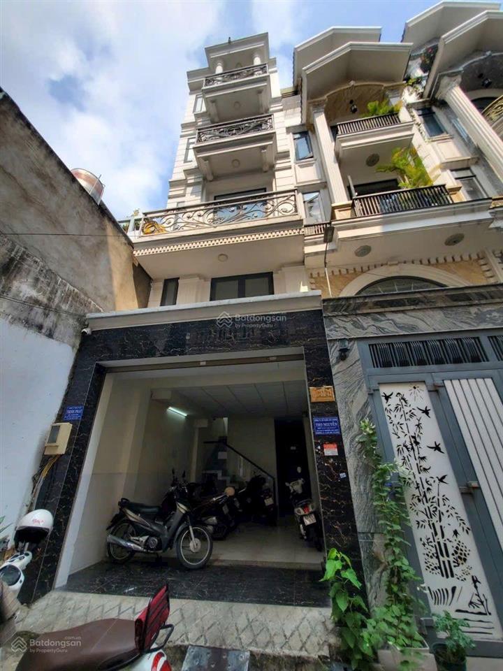 8tỷ thang máy tiền thuê 40tr 9 phòng có gác| 2 mặt hẻm xe hơi tránh