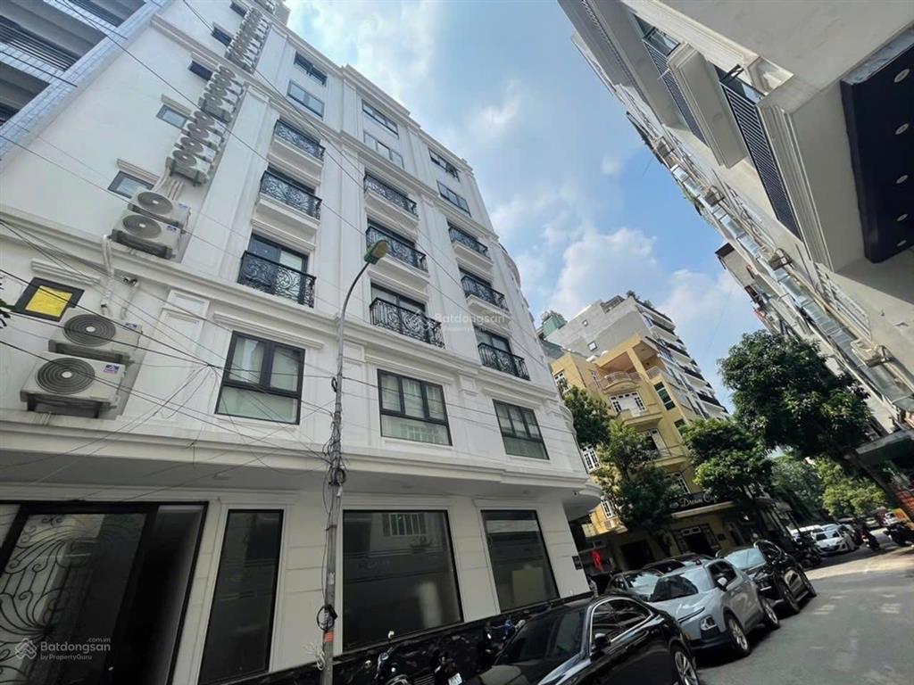 Tòa nhà 10 tầng  dương khuê lô góc 180m  89 tỷ