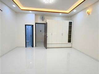 Nhà mới 100%  trệt + 2 lầu + sân thượng p tân sơn nhì sổ hồng riêng