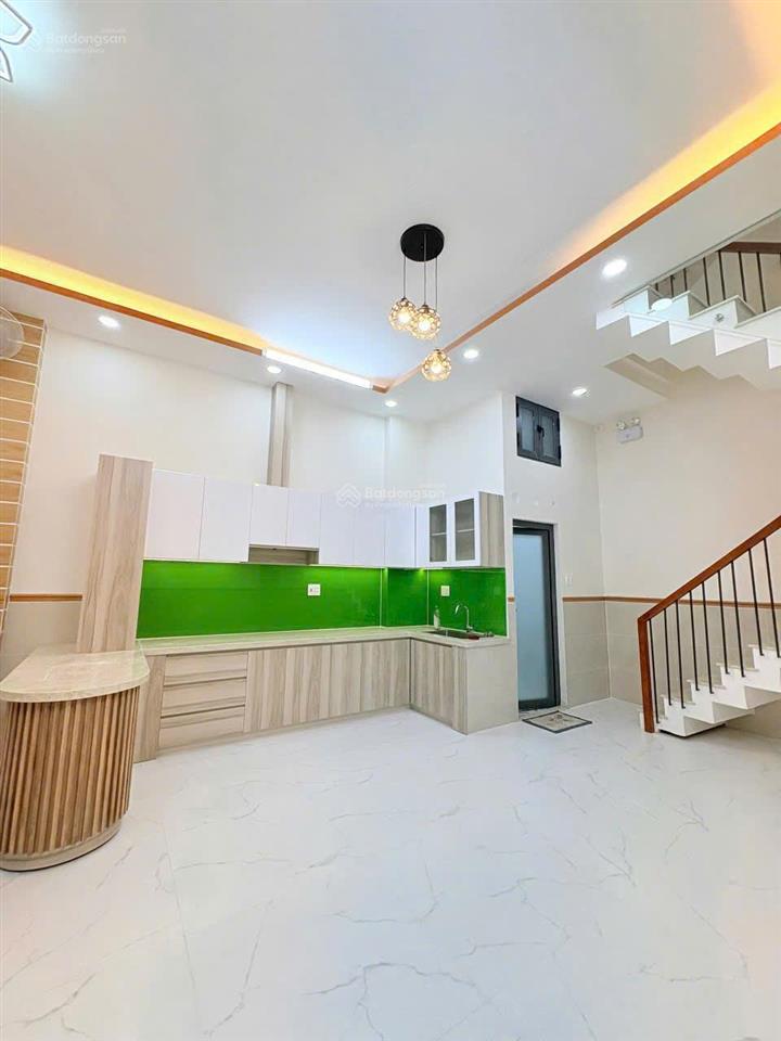 Nhà mới 100%  trệt + 2 lầu + sân thượng p tân sơn nhì sổ hồng riêng