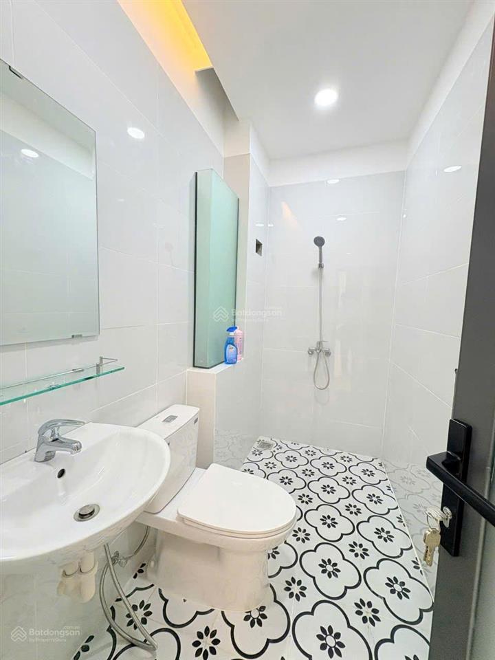 Nhà mới 100%  trệt + 2 lầu + sân thượng p tân sơn nhì sổ hồng riêng