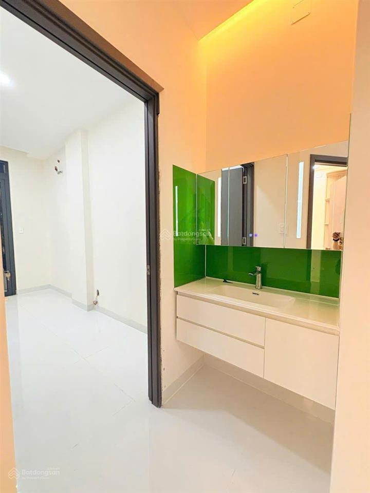 Nhà mới 100%  trệt + 2 lầu + sân thượng p tân sơn nhì sổ hồng riêng