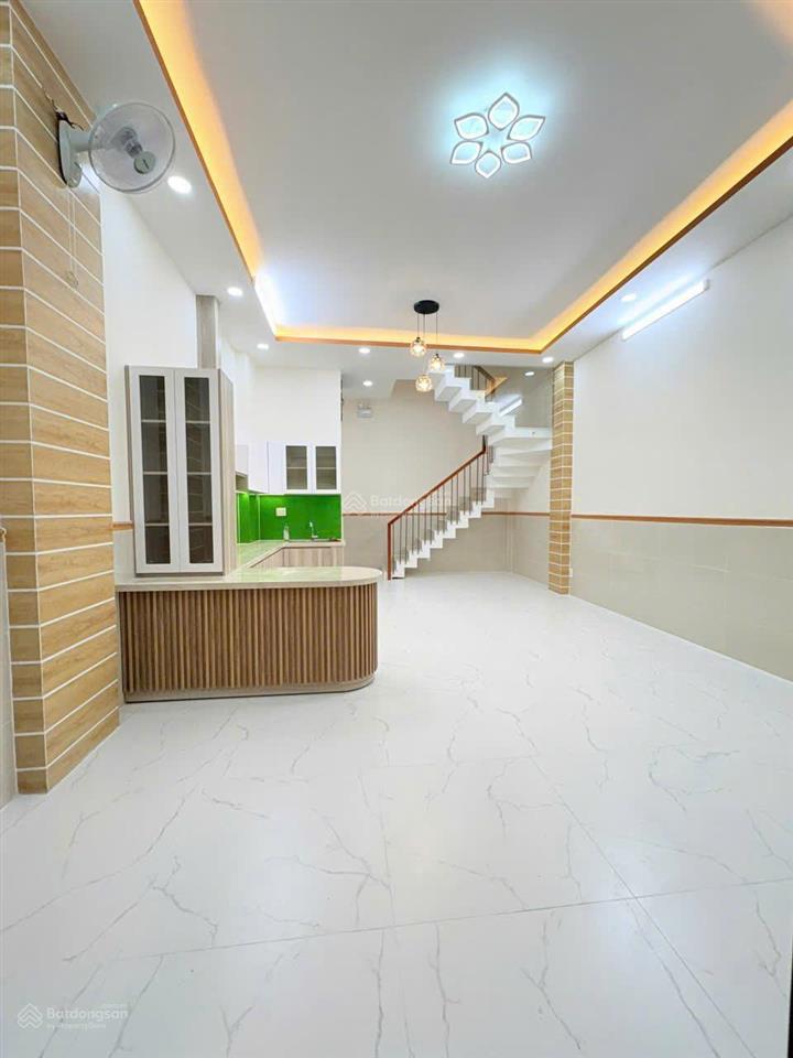 Nhà mới 100%  trệt + 2 lầu + sân thượng p tân sơn nhì sổ hồng riêng