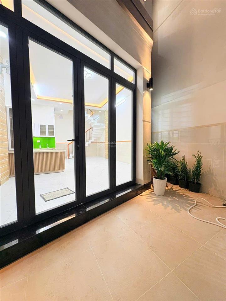 Nhà mới 100%  trệt + 2 lầu + sân thượng p tân sơn nhì sổ hồng riêng