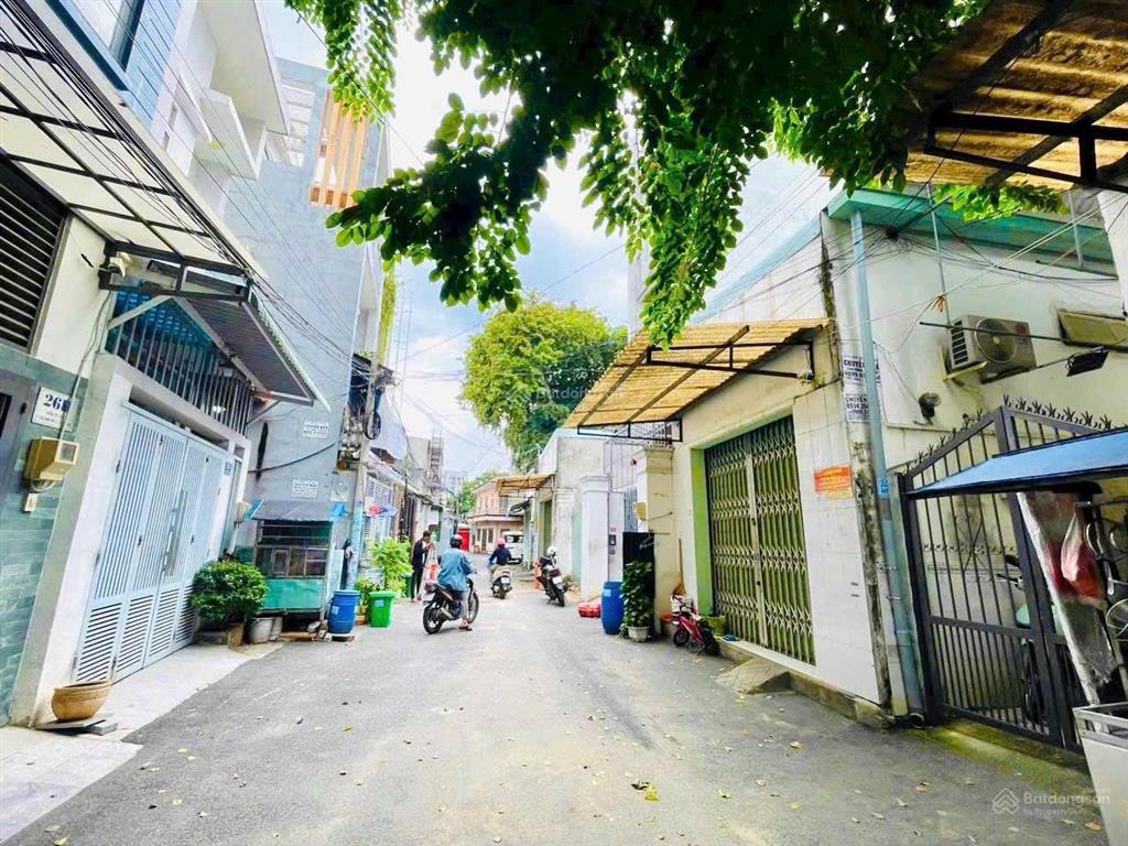 Bán căn hộ dịch vụ 1 trệt 3 lầu có 8 phòng, cho thuê 32tr/tháng, hẻm xe hơi đường man thiện