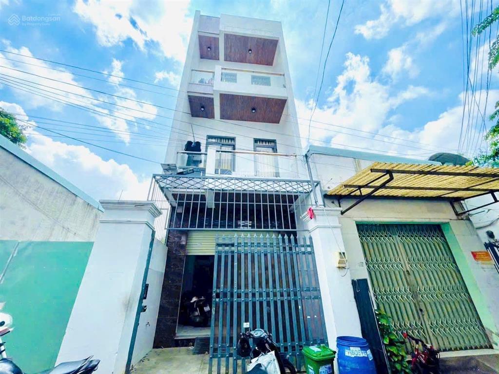 Bán căn hộ dịch vụ 1 trệt 3 lầu có 8 phòng, cho thuê 32tr/tháng, hẻm xe hơi đường man thiện