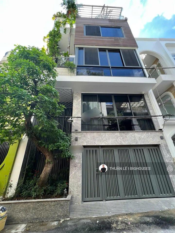 Nhà đẹp  khu villa. hẻm 6m nguyễn trọng tuyển. ngang lớn 7,5m x 12m. nhà 4 tầng st/6pn + gara lớn