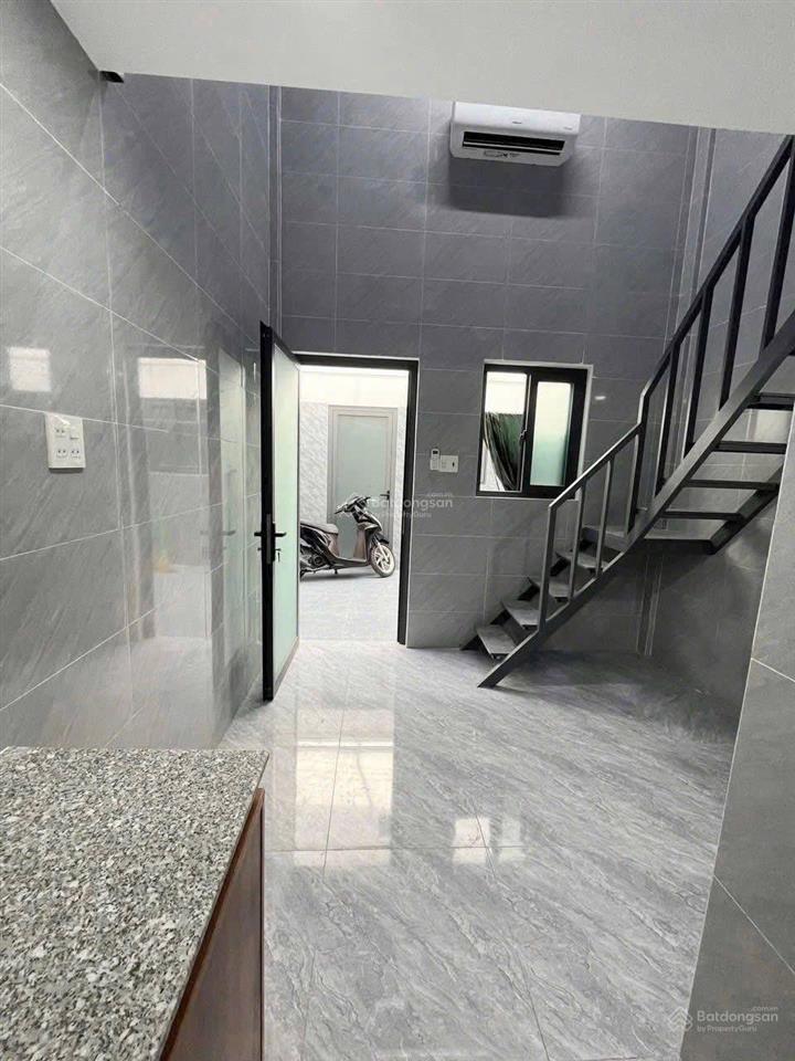 Bán cắt lỗ 300tr nhà 1 trệt 1 lầu đường ql50  bình chánh giáp q8 sổ hồng riêng