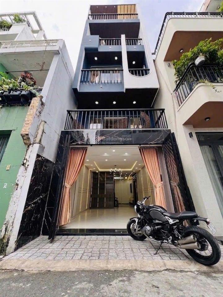 S.iêu phẩm phú nhuận  thích quảng đức  hẻm ôto  5 tầng 4pn & 50m2  thang máy  chỉ 10.**