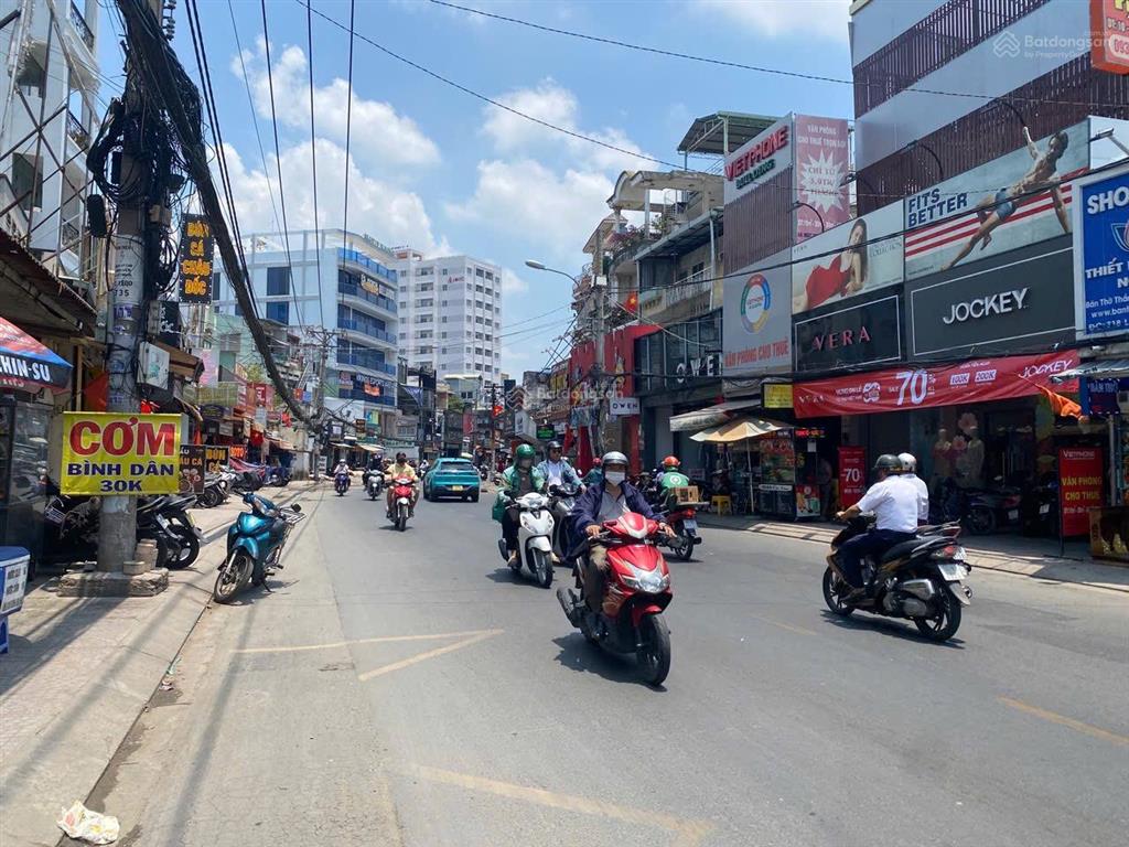 Bán nhà mtkd 4 tầng mới đẹp ngay nơ trang long  lê quang định, dts 200m2, 6pn, giảm còn 15.49 tỷ