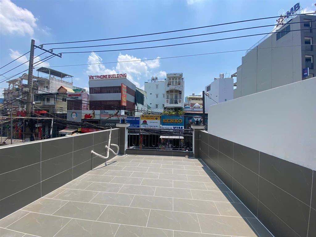 Bán nhà mtkd 4 tầng mới đẹp ngay nơ trang long  lê quang định, dts 200m2, 6pn, giảm còn 15.49 tỷ