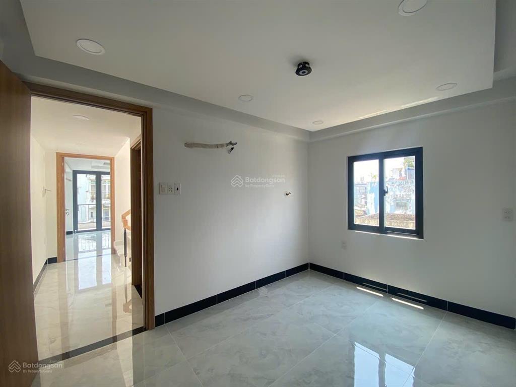 Bán nhà mtkd 4 tầng mới đẹp ngay nơ trang long  lê quang định, dts 200m2, 6pn, giảm còn 15.49 tỷ