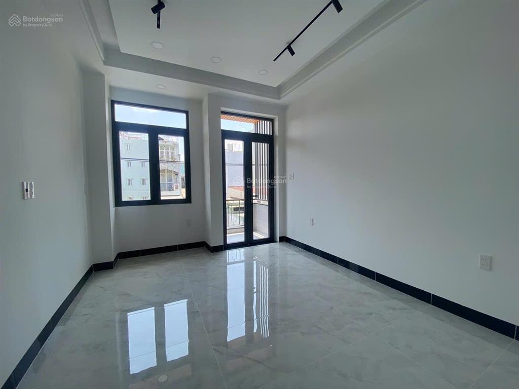 Bán nhà mtkd 4 tầng mới đẹp ngay nơ trang long  lê quang định, dts 200m2, 6pn, giảm còn 15.49 tỷ