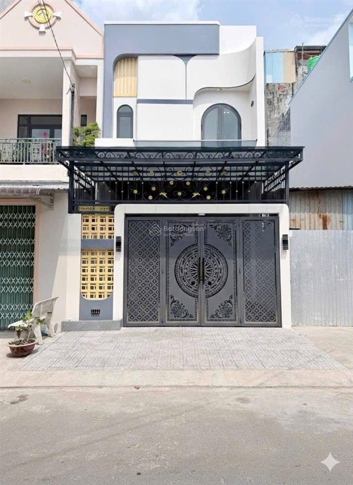 Nhà 5,2x18, 1 trệt 1 lầu. giá 1tỷ, kế bên chợ hưng long, bình chánh
