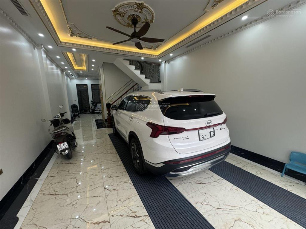 Bán nhà khuất duy tiến 58m2  5 tầng  mt 4.5m  gara  ô tô tránh  kinh doanh  giá chỉ 18.5 tỷ