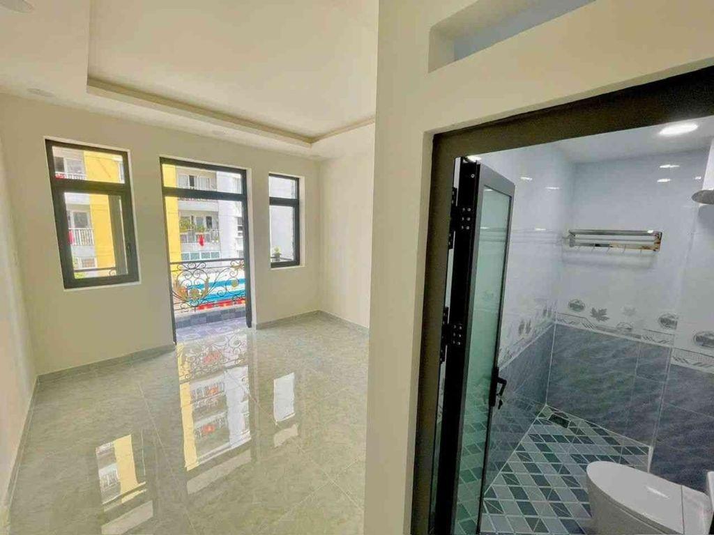 Nhà 3 tần xây mới An Dương Vương - Lý Chiêu Hoàng (đt 52m) hẻm xe hới né nhau 7₫ nhỉnh #00193 