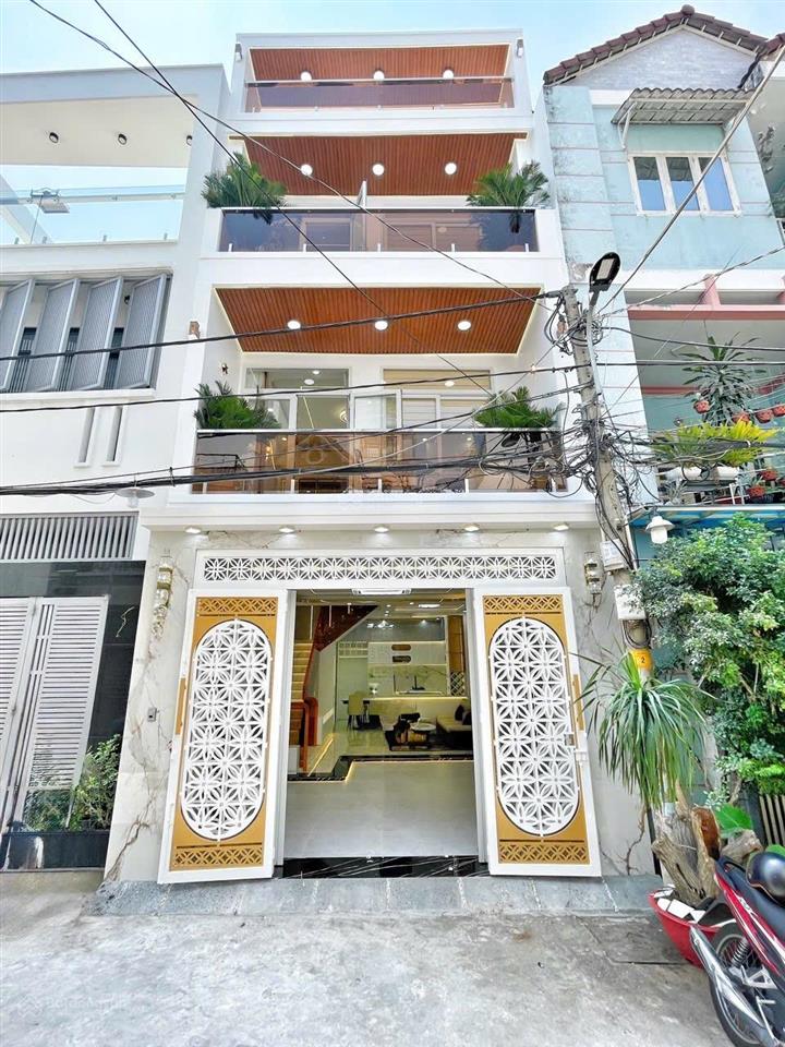 Nhà mới ở ngay  hẻm xe hơi ngủ trong nhà  kế bên phú mỹ hưng  nhỉnh 10 tỷ