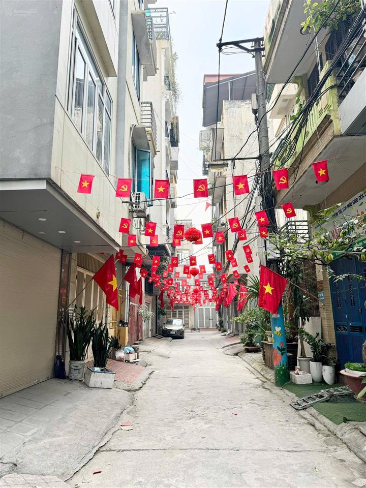 Hiếm! phân lô hoàng văn thái  50m2  6 tầng  thang máy  gara ô tô 2 thoáng  sổ hoa hậu