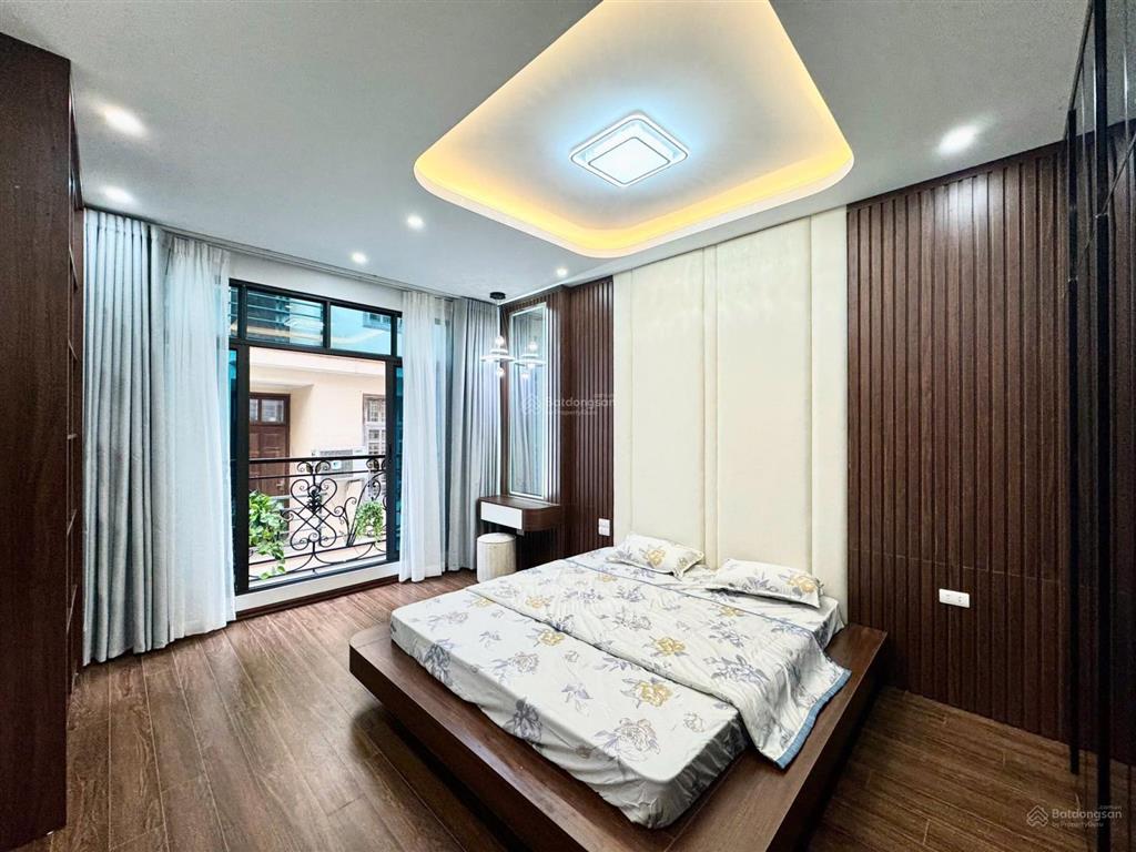 Hiếm! phân lô hoàng văn thái  50m2  6 tầng  thang máy  gara ô tô 2 thoáng  sổ hoa hậu