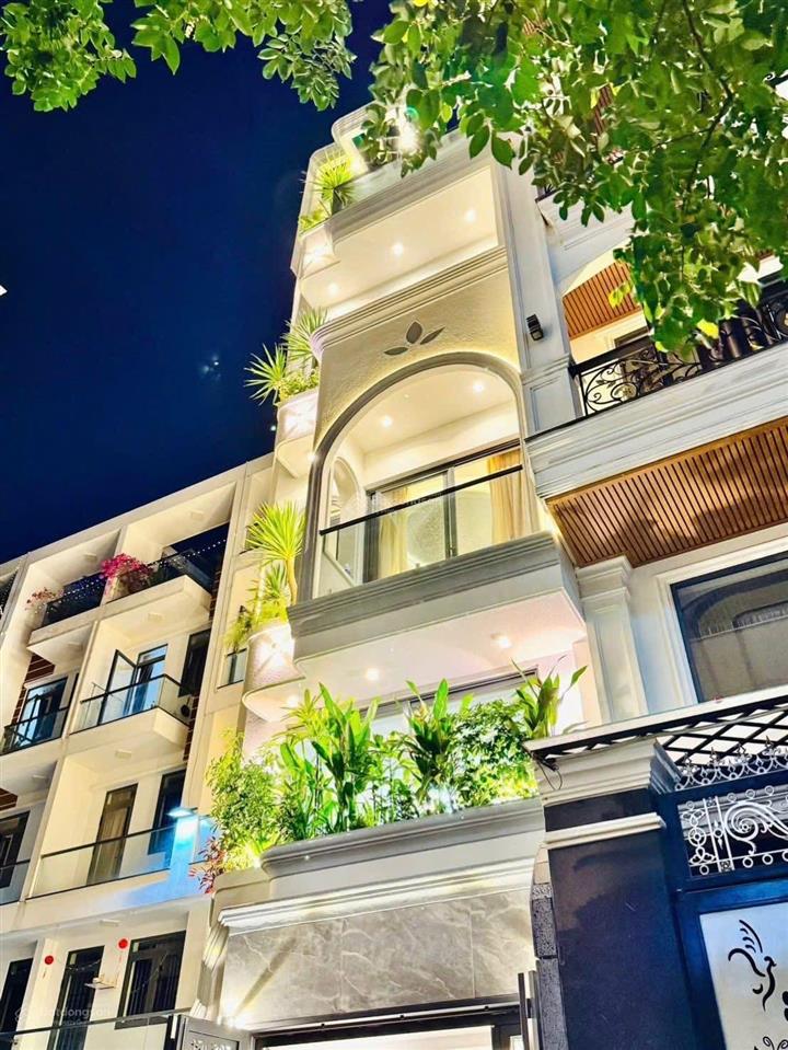 Nhà đẹp lê quang định,p1,gò vấp  70m2 x 3 tầng  giá 5tỷ780, 3pn, 4wc, 1 trệt 2 lầu, hẻm oto