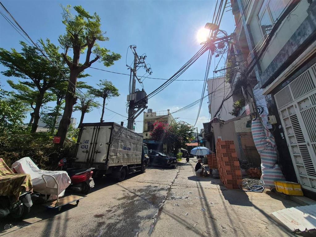 Nhà nát 220m2(7*33) hẻm nhựa xe tải thông sát đại hoc văn hiến (âu cơ bàu cát)gpxd 7 tầng