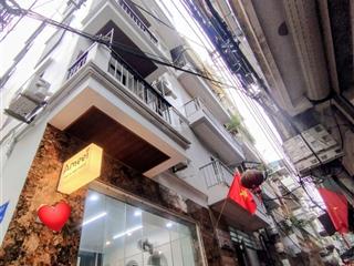 Mặt ngõ ô tô kinh doanh 24/7 lô góc 2 thoáng gần phố thuỵ khuê .dt, 44 m x 6 tầng thang máy.